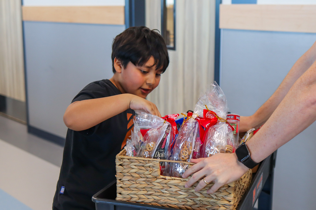Student picking out their prize