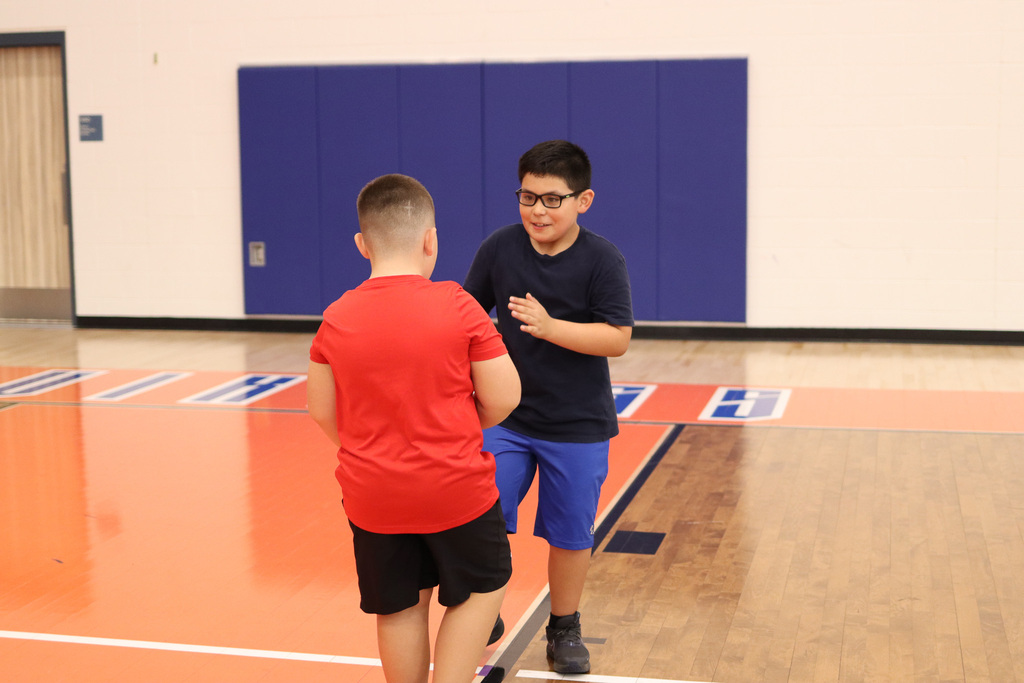 Students dancing La Raspa in PE/Music for National Hispanic Heritage Month
