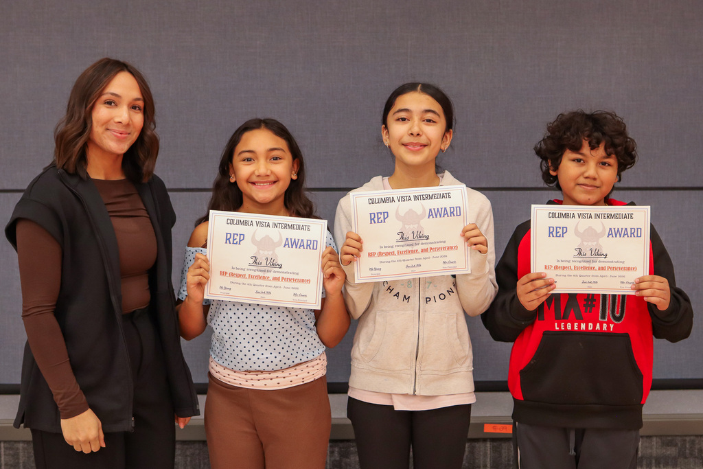 Photo of Mrs. Fuentes and her REP Award winners