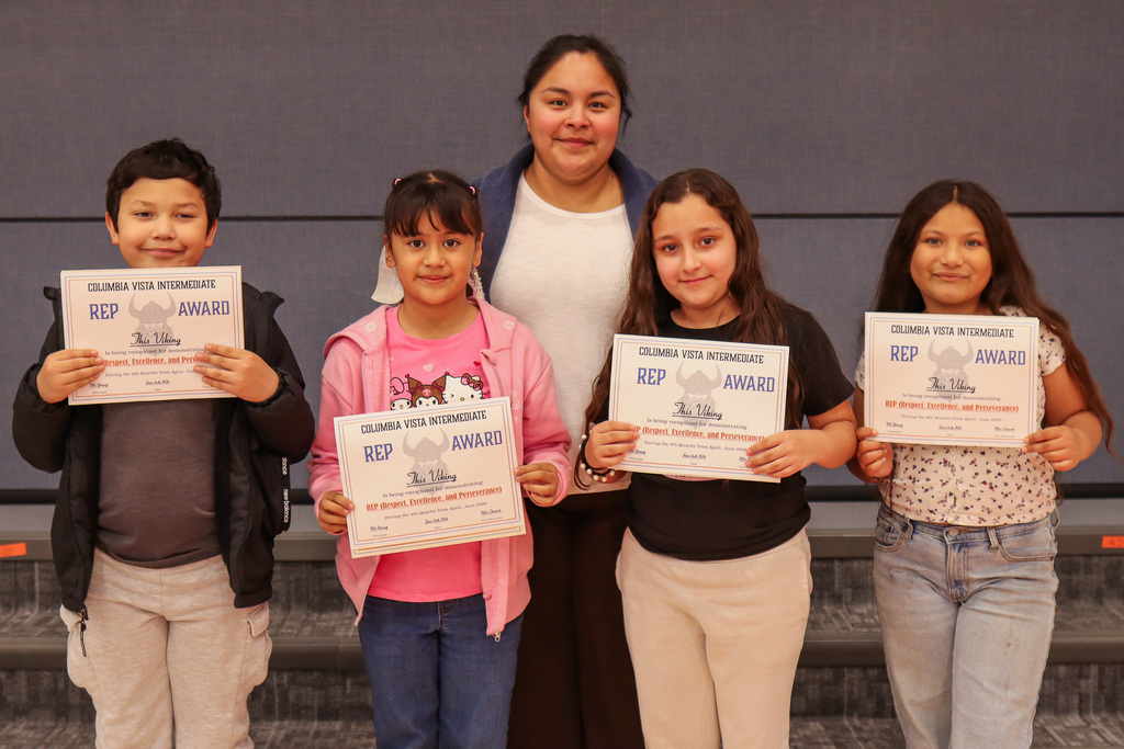 Photo of Mrs. Serratos and her REP Award winners