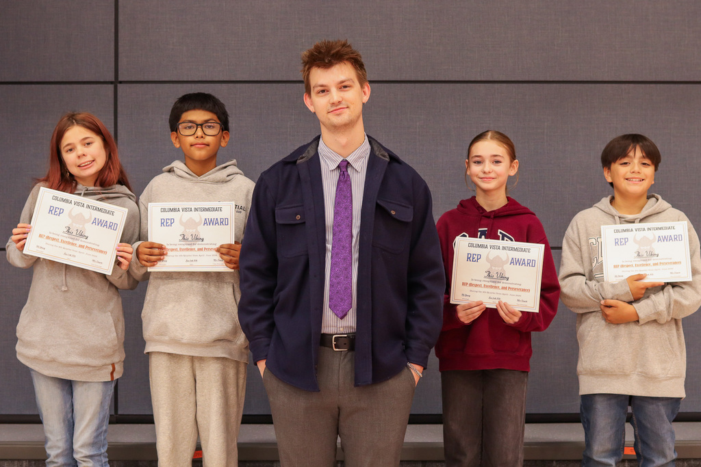 Photo of Mr. Storagee and his REP Award winners