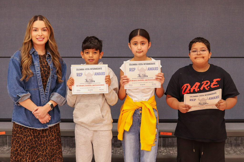 Photo of Mrs. Armenta and her REP Award winners