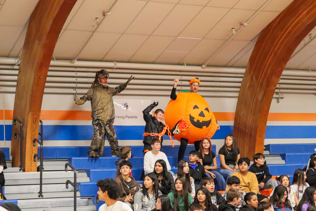students and Mr. Silver cheering on students during the relay race at the CBMS assembly