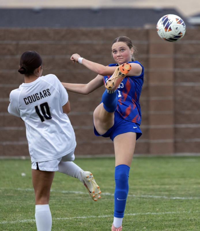 Photo by Kathy Aney Umatilla's Evelyn Christensen kicks the ball as Echo/Stanfield’s Marcelina Almonte (10) avoids contact with Christensen's foot on Sept. 30, 2025, in Umatilla.
