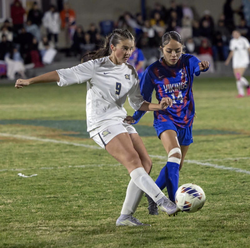 Photo by Kathy Aney Echo's Hope Russell (9) and Umatilla's Yesenia Castaneda (14) go after the ball on Nov. 4, 2025, during a state playoff game in Umatilla. The Vikings won the game 3-2.