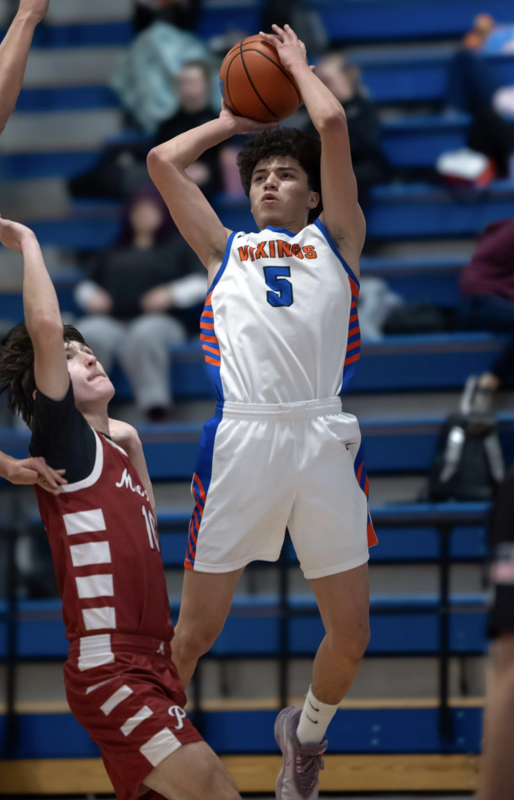 Photo by Kathy Aney Umatilla's Mike McGee (5) shoots a 3-pointer while playing McLoughlin on Jan. 17, 2026, in Umatilla.