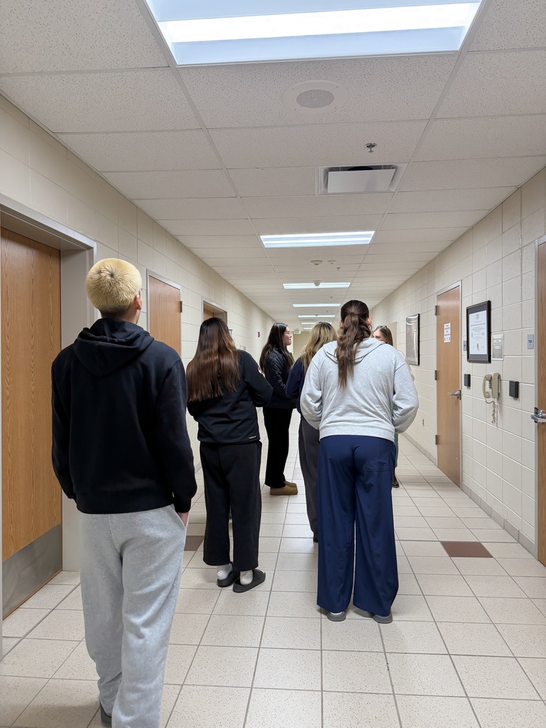 Students tour hallway of Woodbury 911 Center