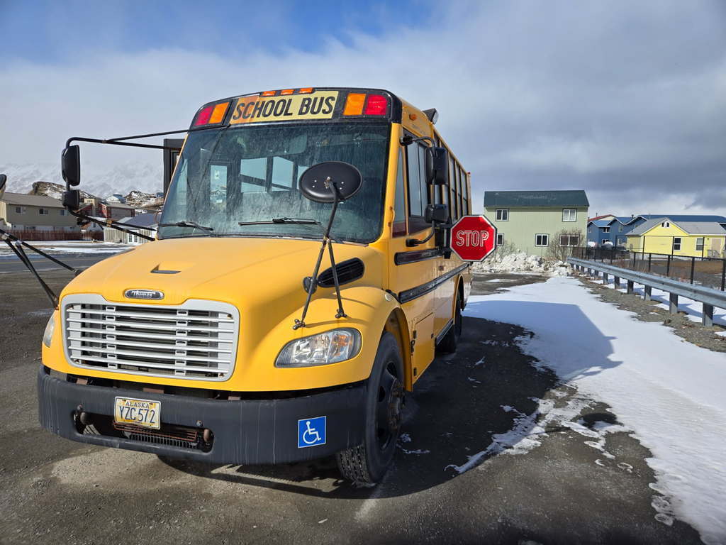 Yellow School Bus with warning signals