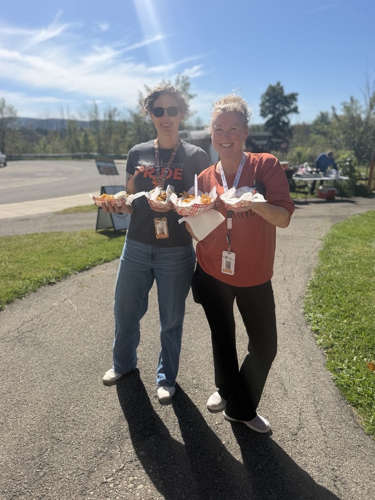 GFJ Staff members with food in their hands