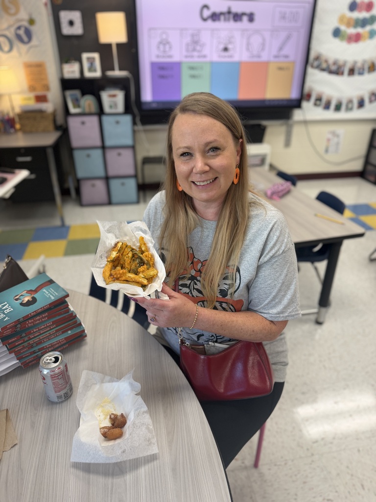 GFJ Staff members with food in her hands