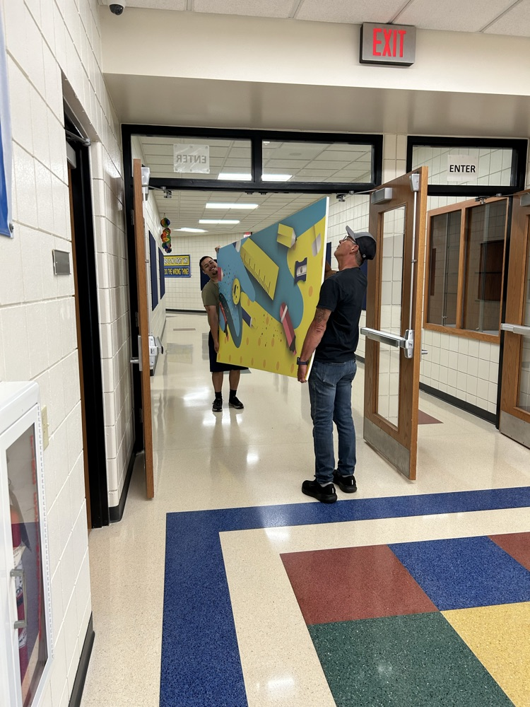 custodians with new art