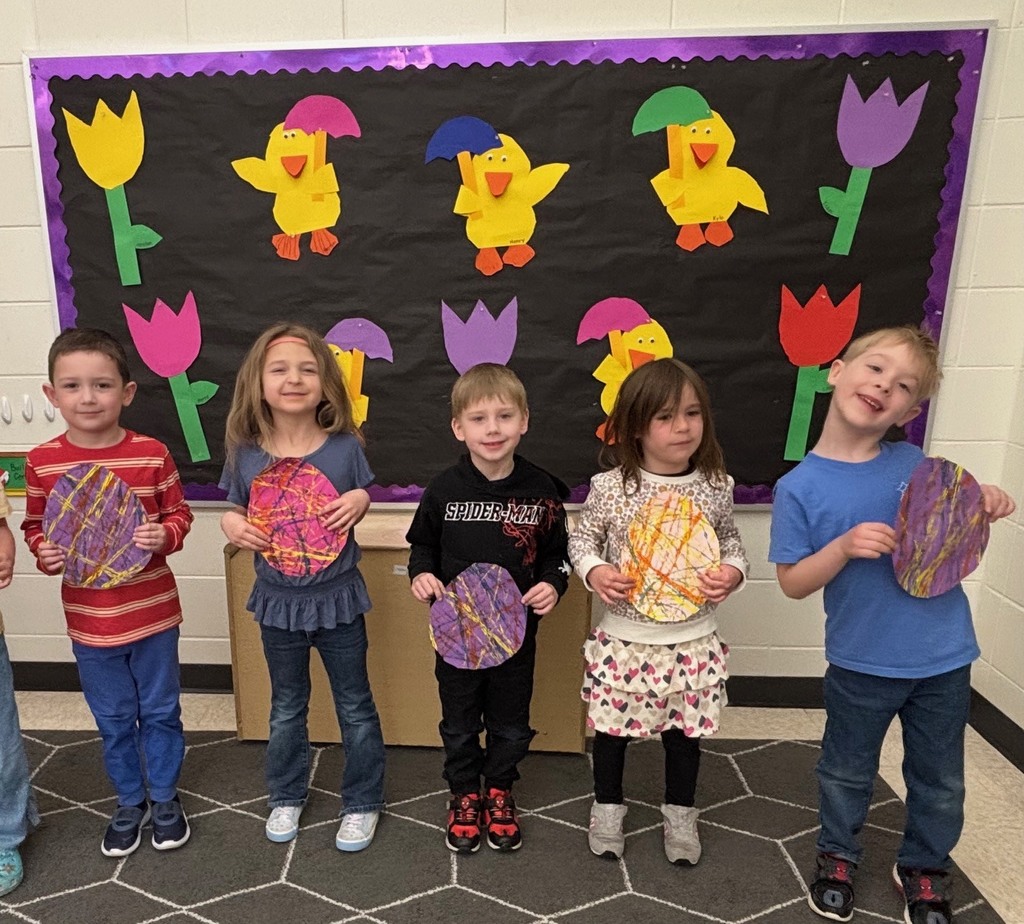 4k students with painted paper eggs