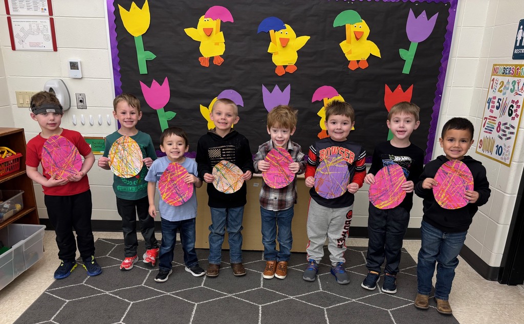 4k students with painted paper eggs