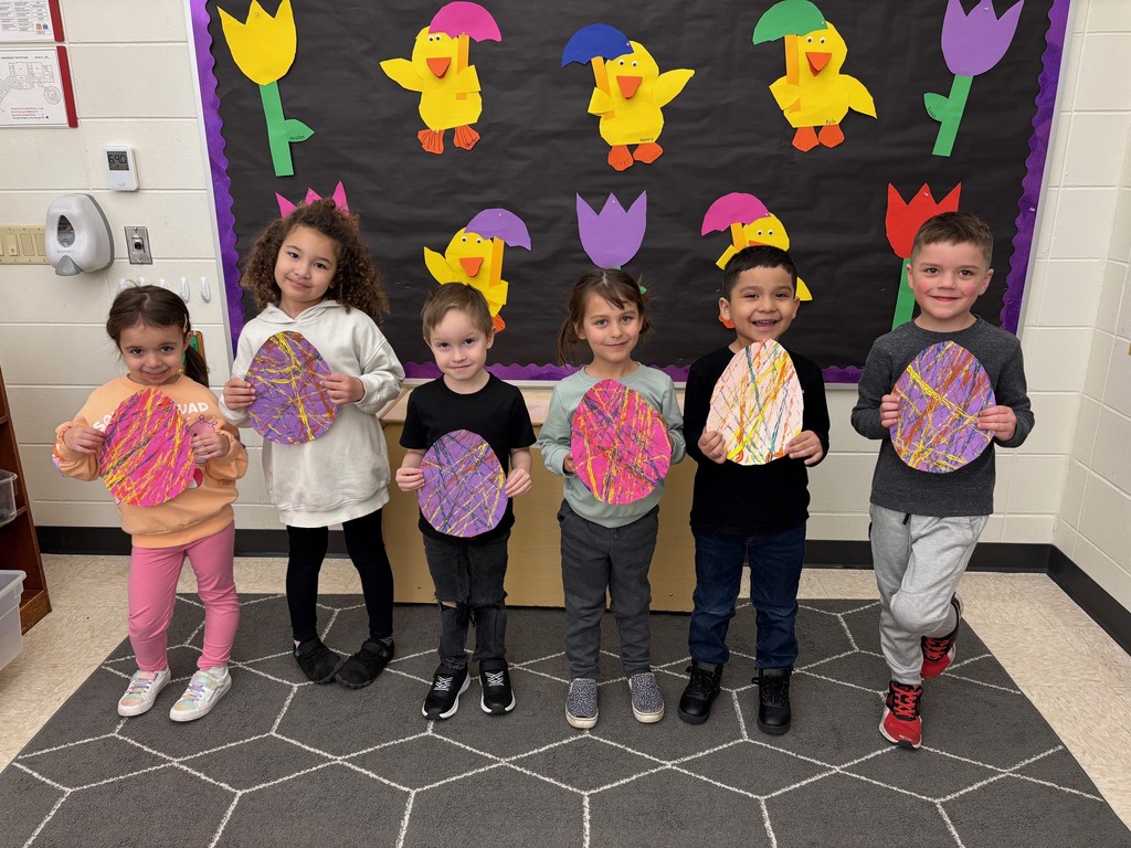 4k students with painted paper eggs