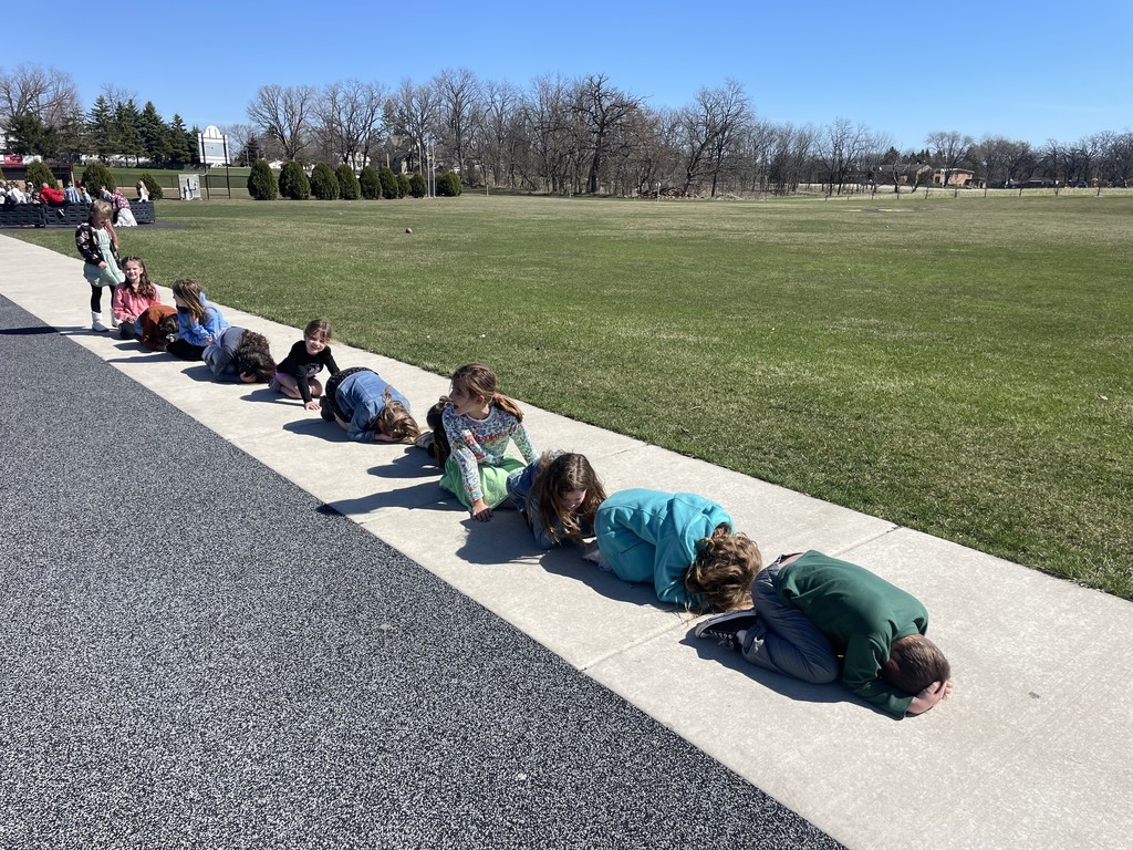 students playing leapfrog