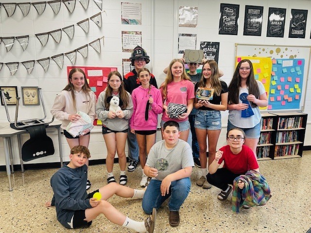 students with items tied to their memories