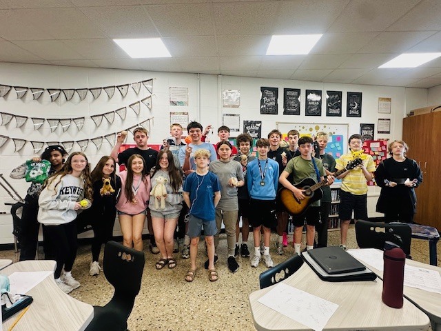 students with items tied to their memories