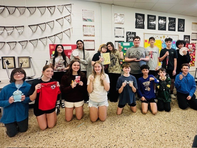 students with items tied to their memories