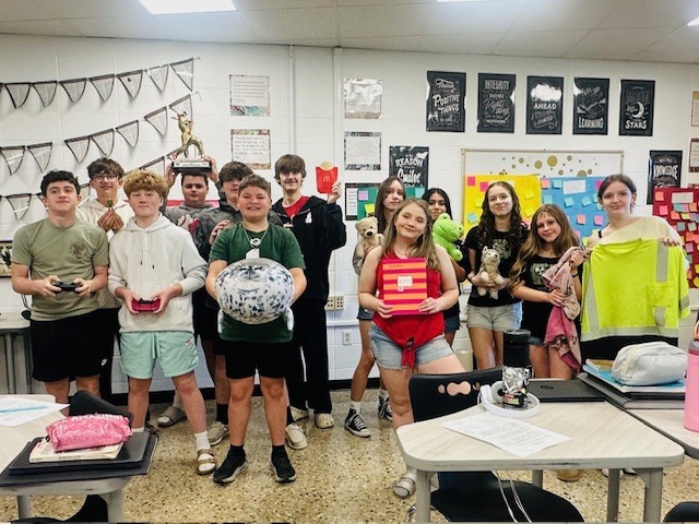 students with items tied to their memories