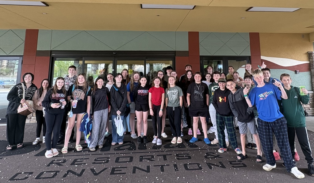 student council and safety patrol pose for a group picture