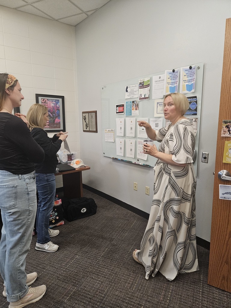 Mrs. Torres showing off her prize hoard