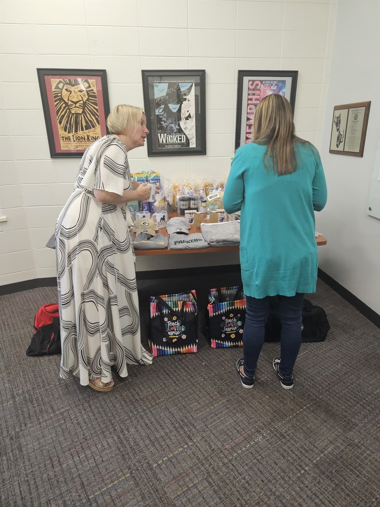 Mrs. Torres showing off her prize hoard