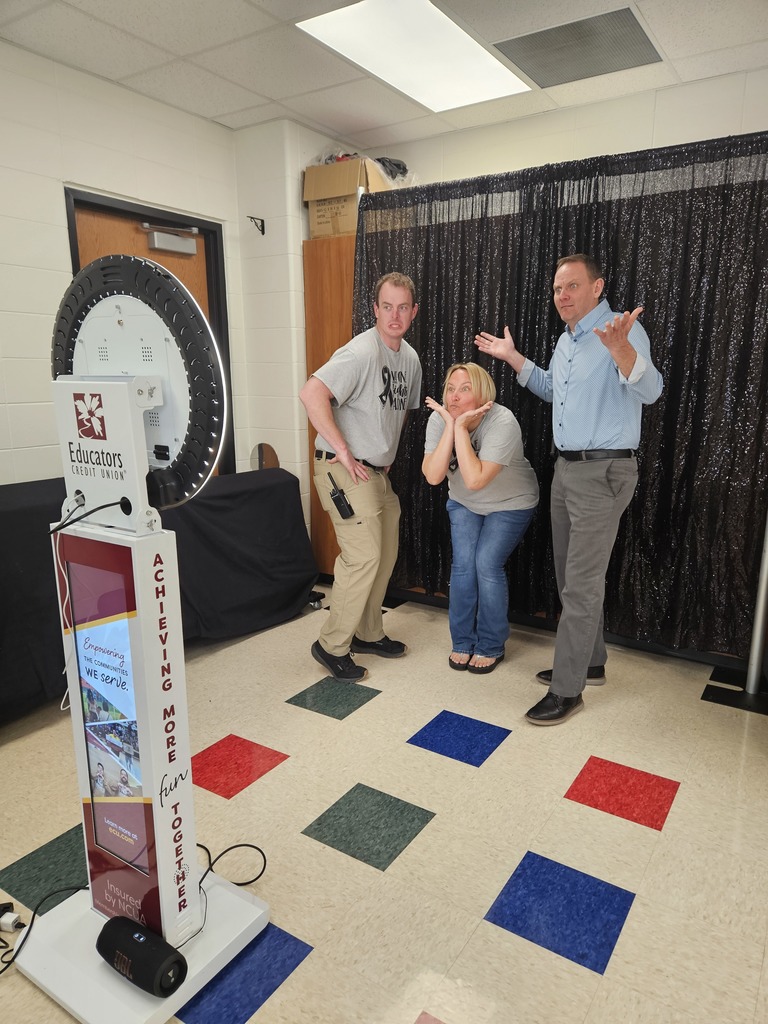 Mr. Sams, Mrs. Torres, and Mr. Hansen being goofy in the photo booth