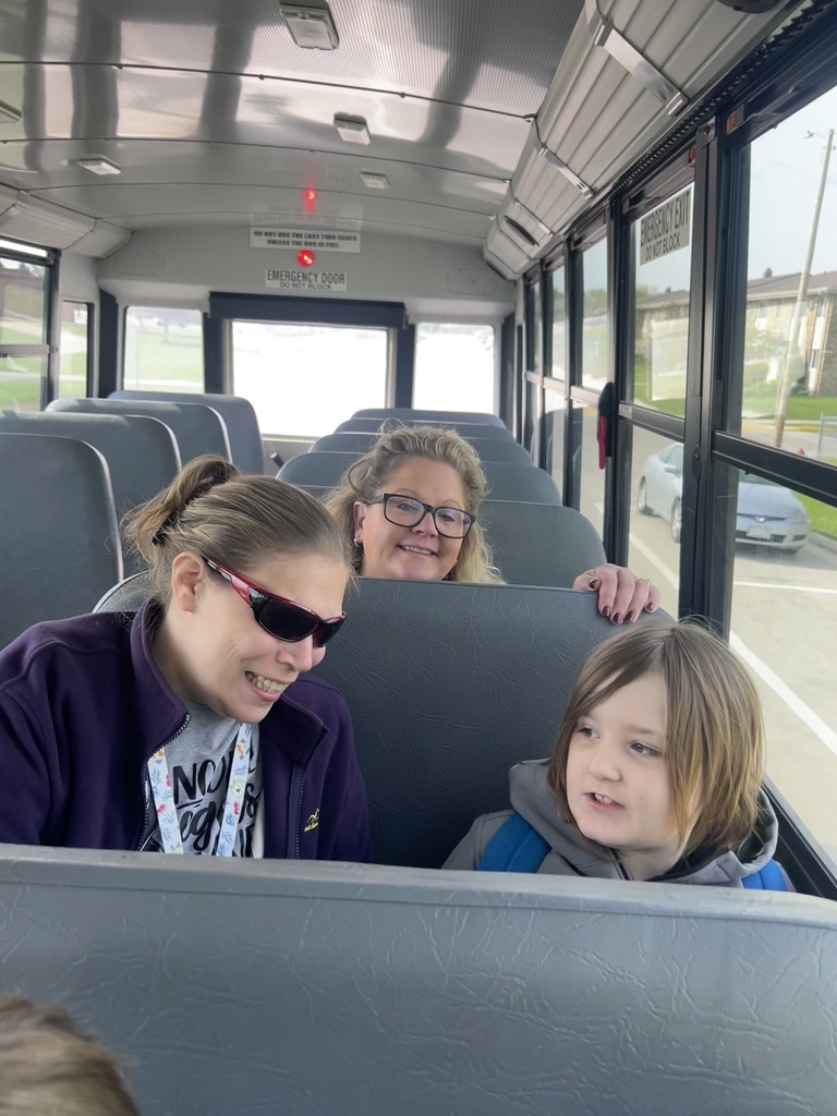 students on a field trip on the bus