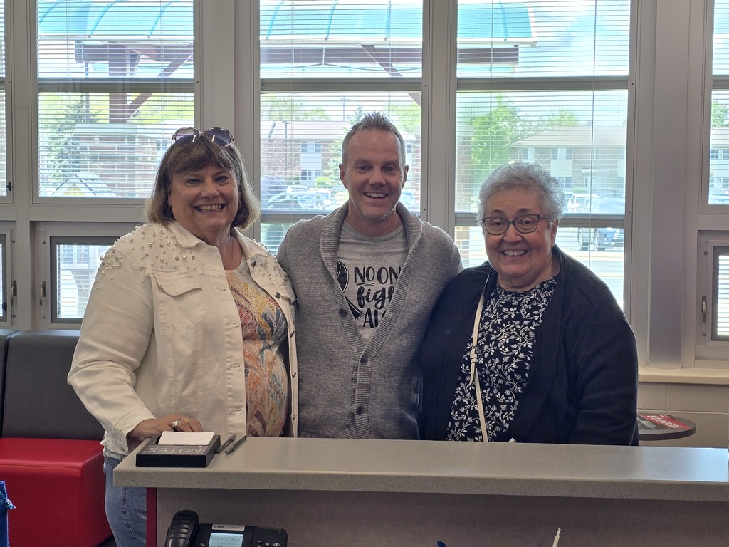retirees Mrs. Grise and Mrs. George with Mr. Cleven