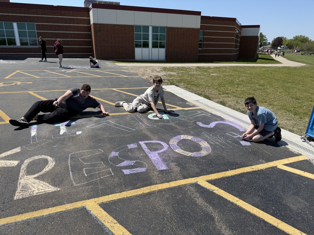 students with their chalk creations