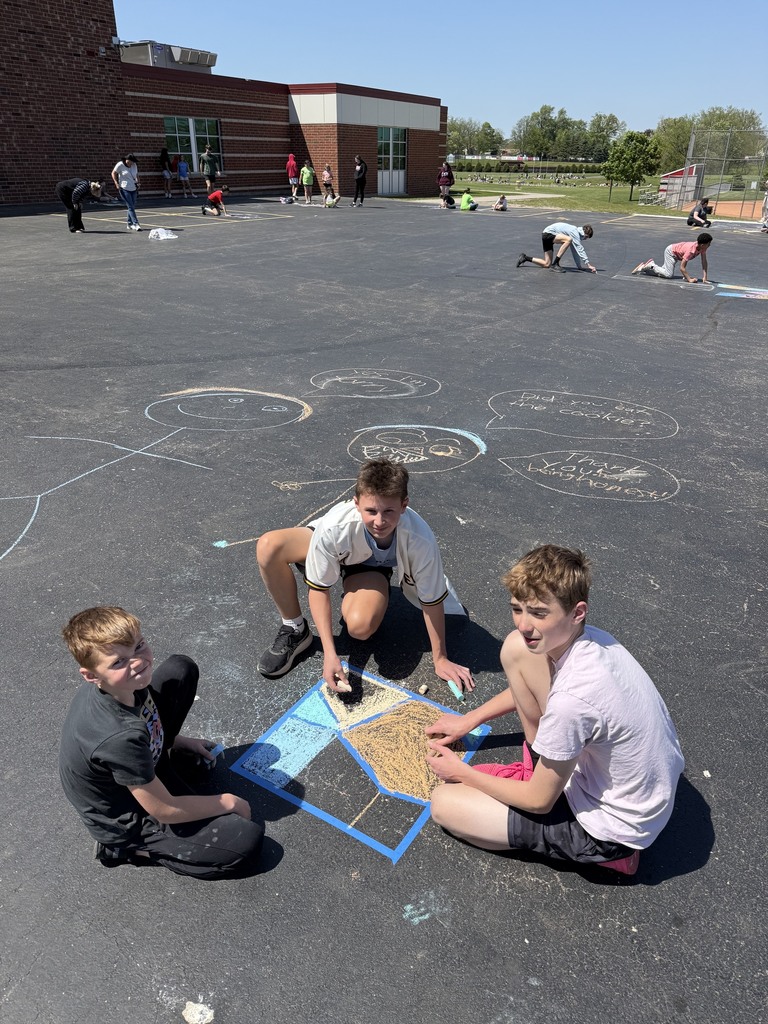 students with their chalk creations