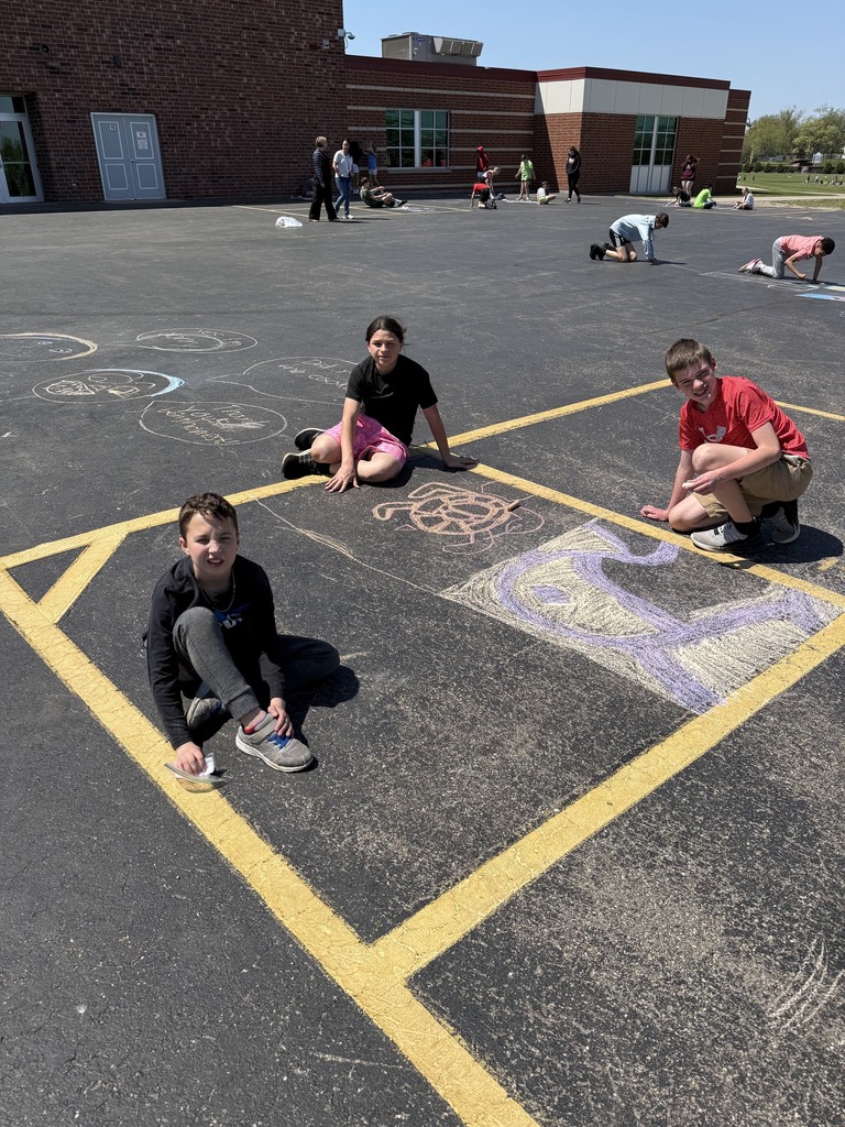 students with their chalk creations