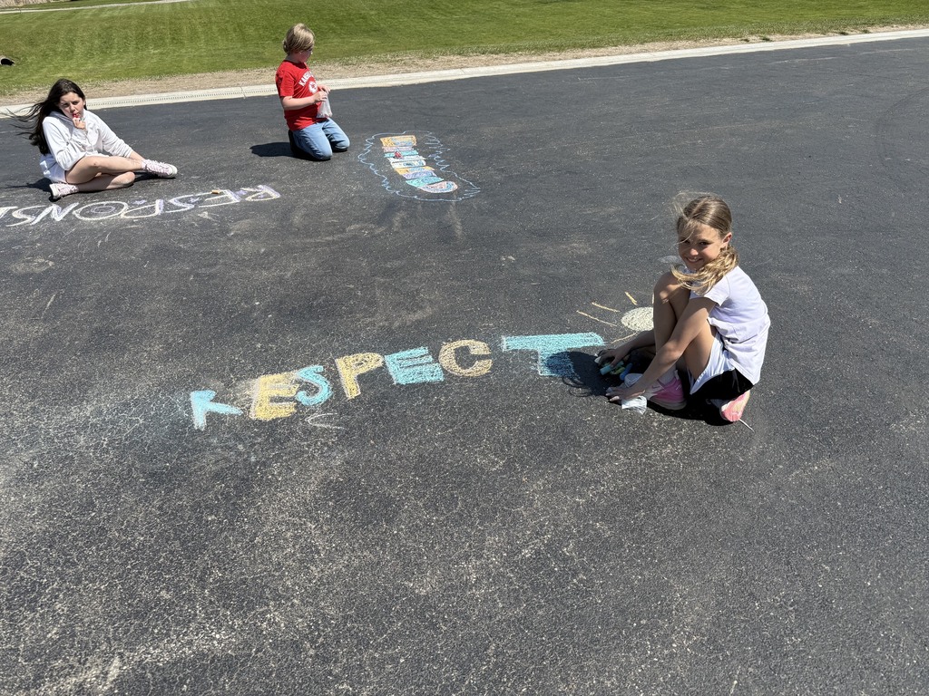 students with their chalk creations