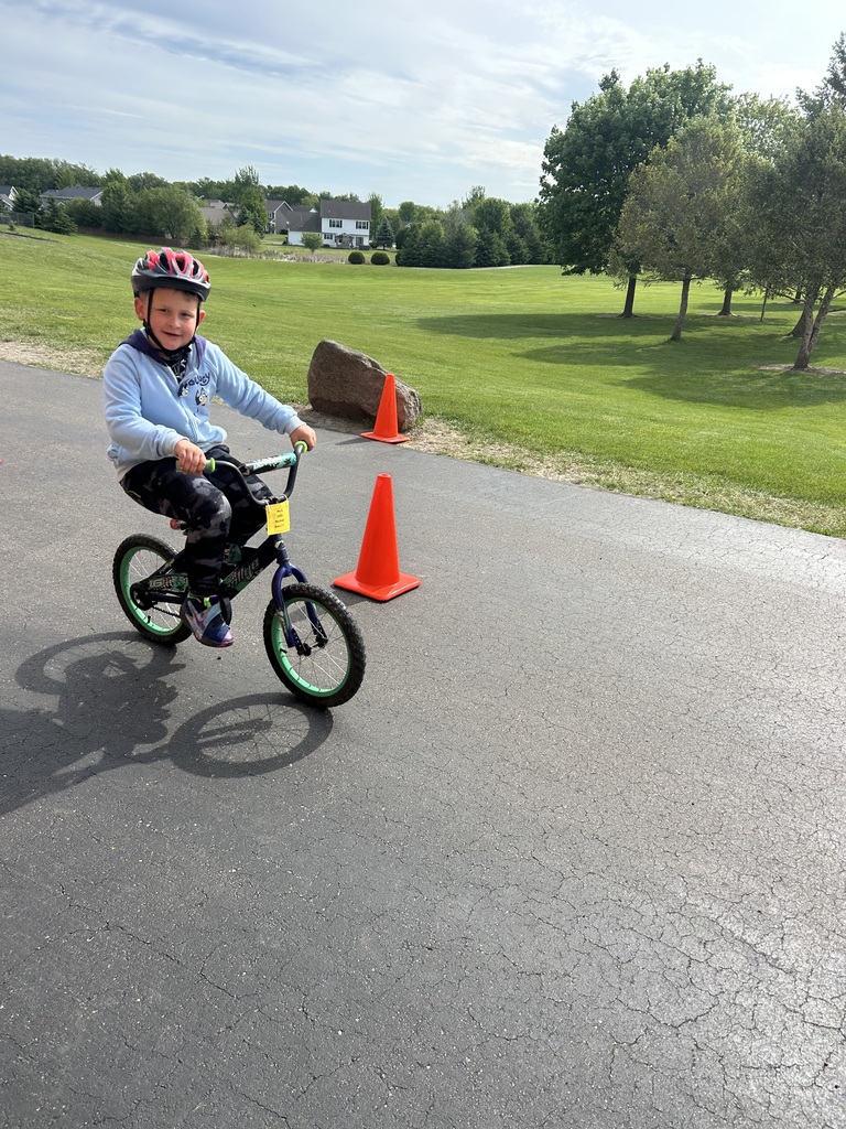 1st graders at the bike rodeo wearing their new helmets