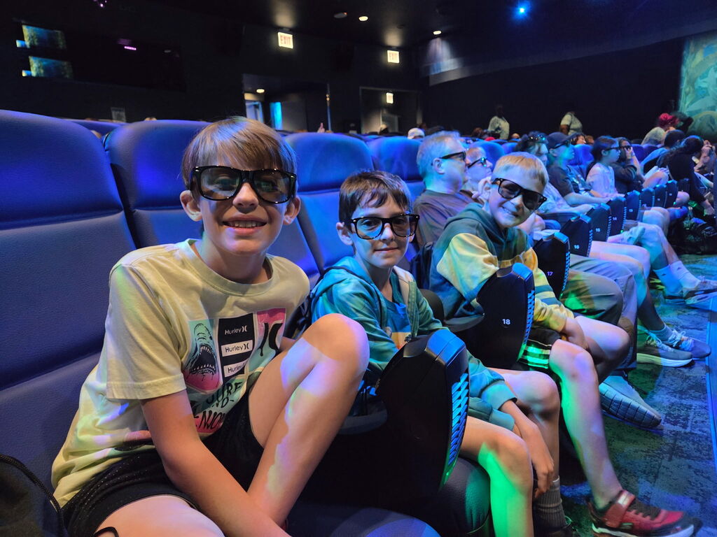 students with 3D glasses for a show at the Shedd Aquarium