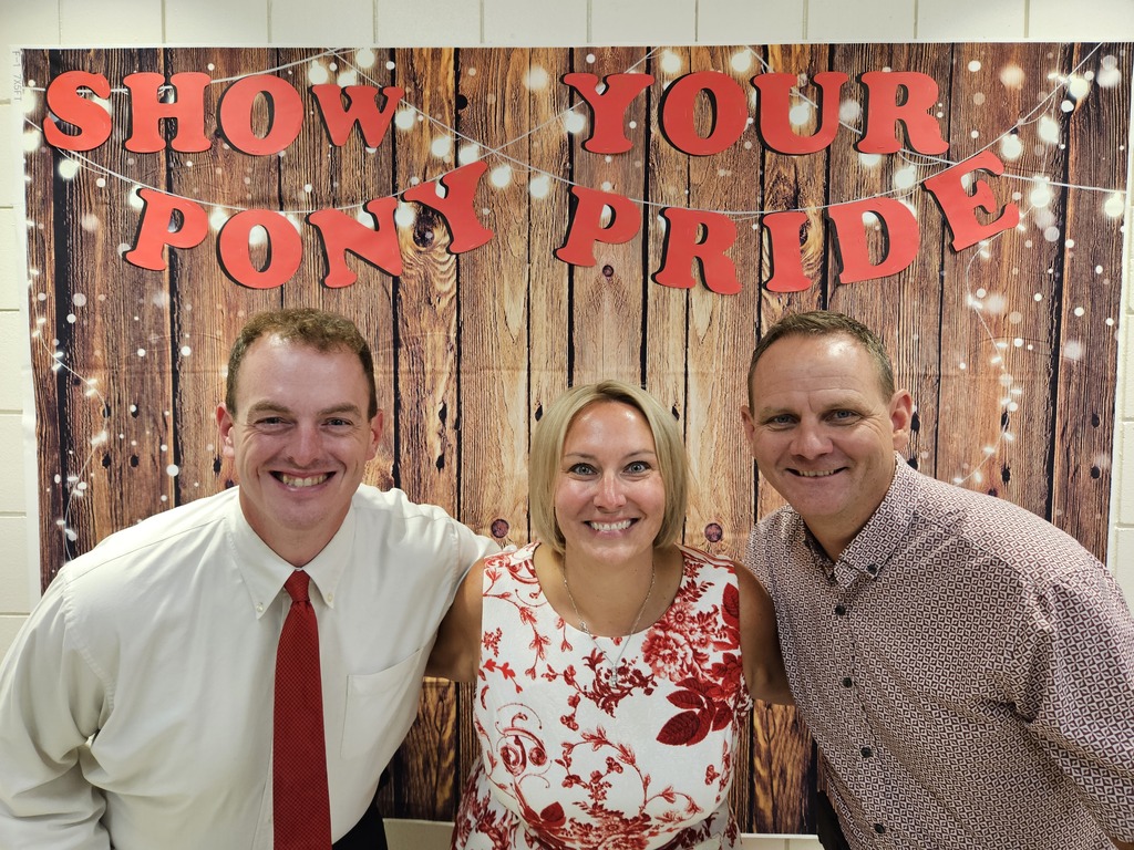 Mr. Sams, Mrs. Torres, and Mr. Hansen pose for the camera
