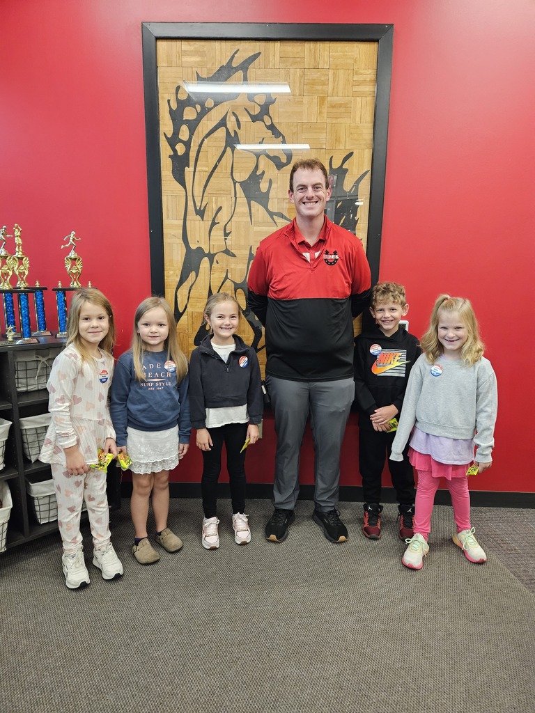 Students pose with Mr. Sams