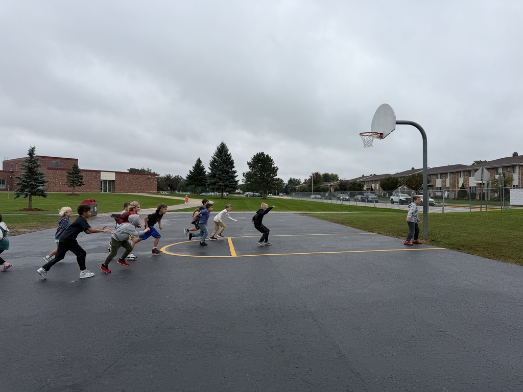 students playing red light green light