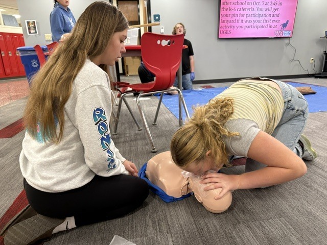 students practice CPR skills