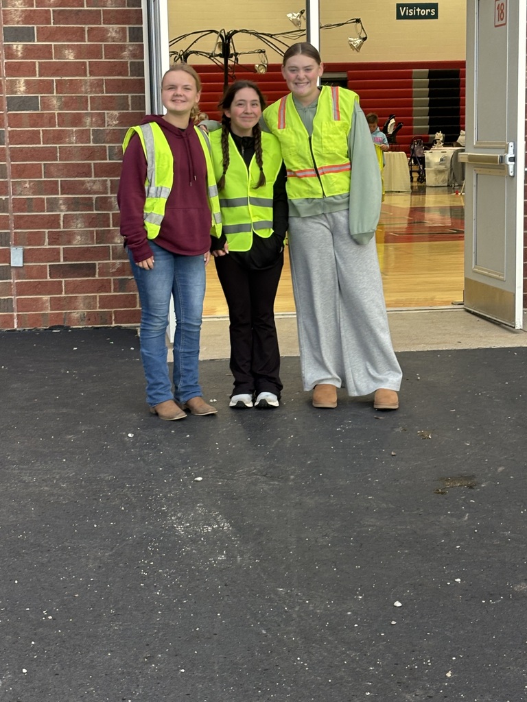 Safety Patrol students pose for a picture in their safety vests