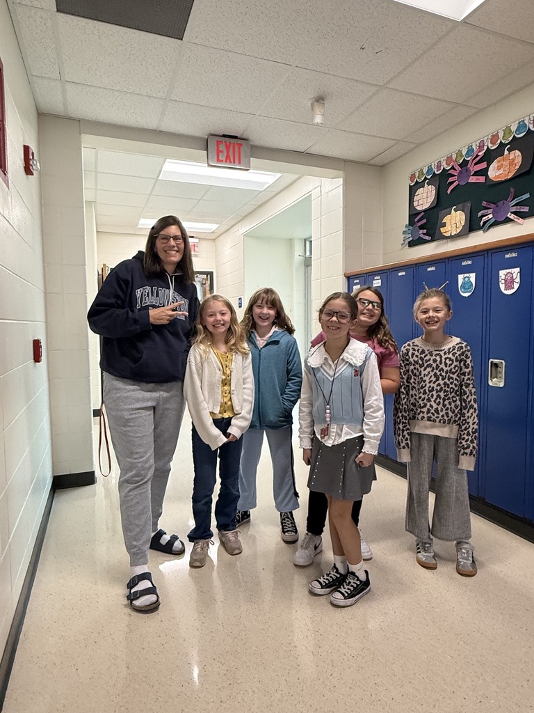 Mrs. Orcutt dressed as a student with her students dressed as teachers