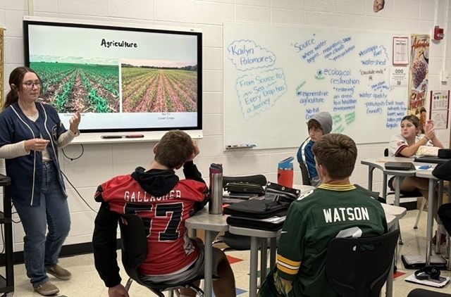 students in a classroom with a presenter