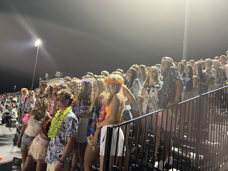cheering on the football team