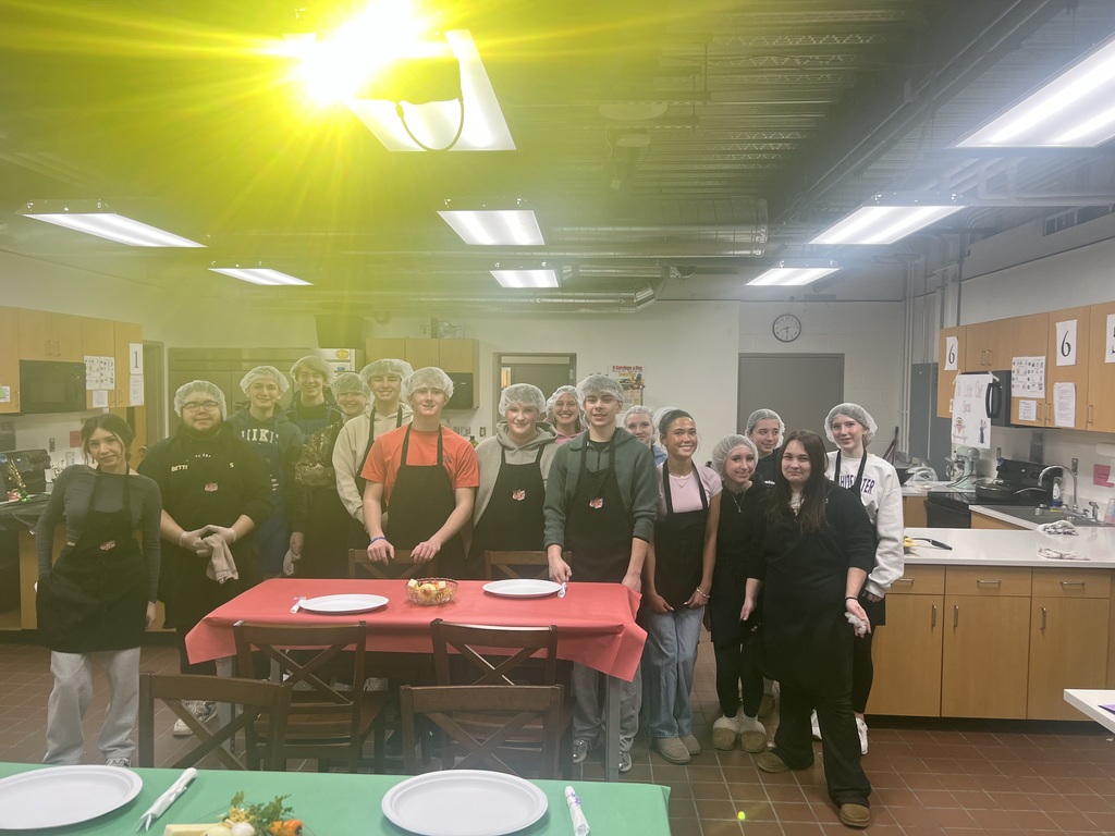 Students standing in foods lab