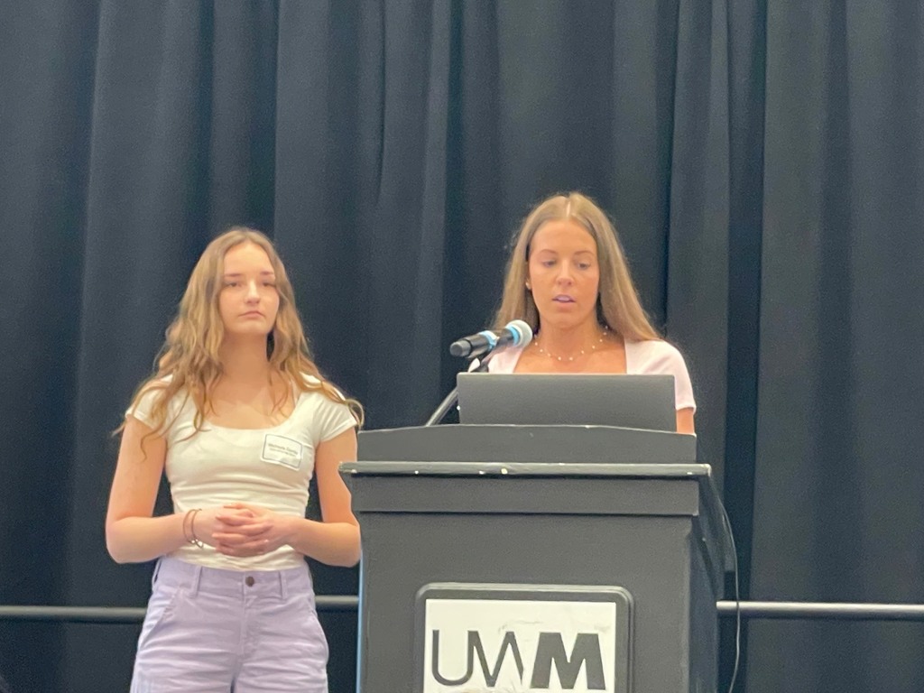 AP Bio students at podium