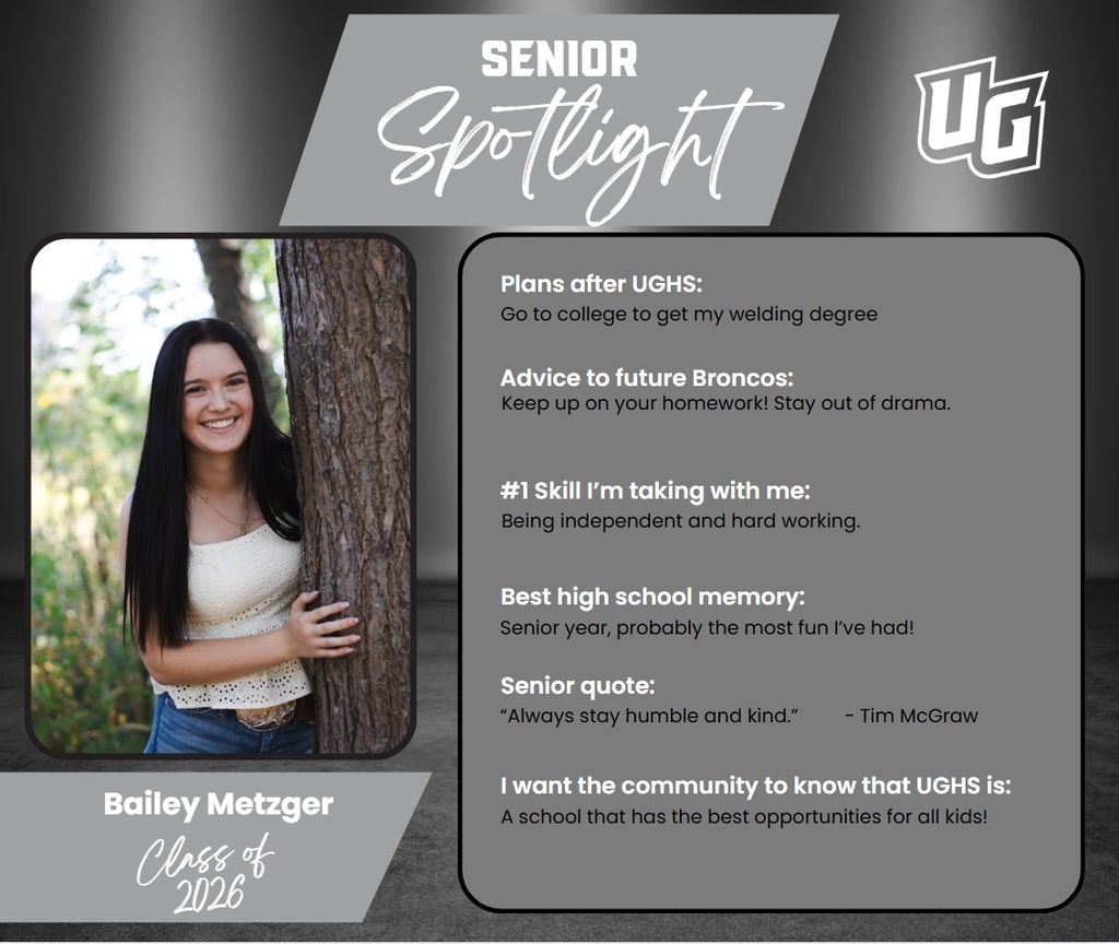 A person poses for a photo, standing behind a tree. The photo is part of a profile.