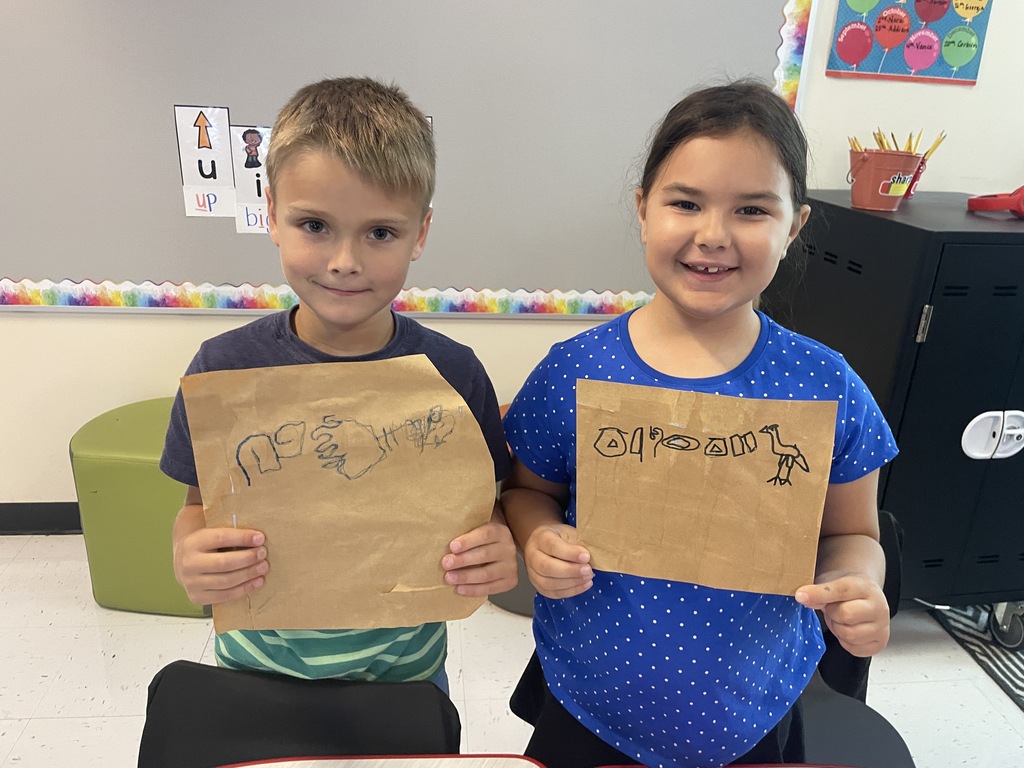 First graders made hieroglyphics on papyrus paper this week.