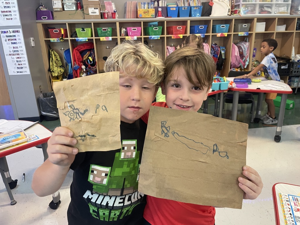 First graders made hieroglyphics on papyrus paper this week.