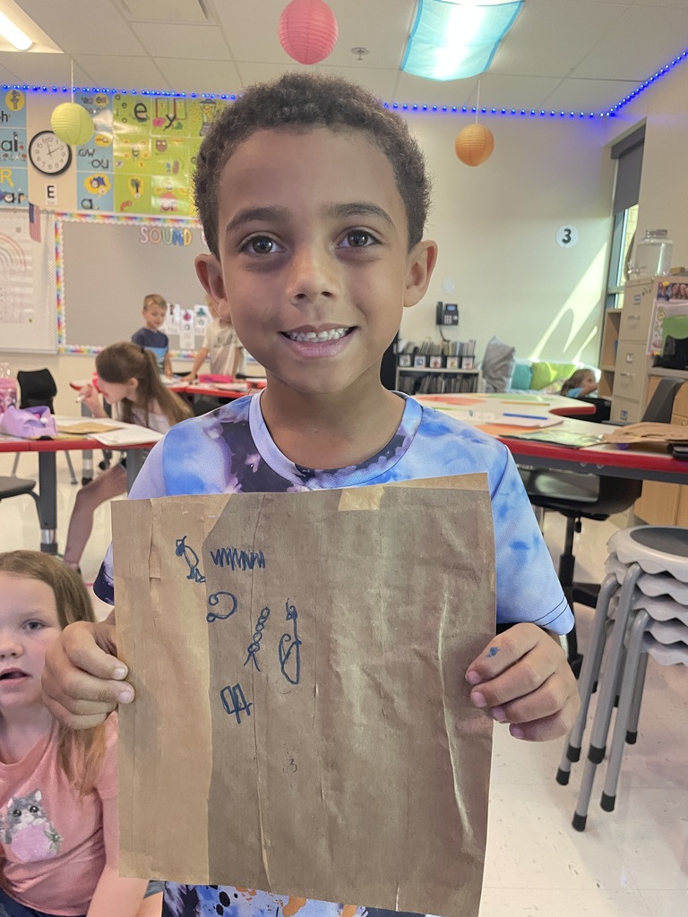 First graders made hieroglyphics on papyrus paper this week.