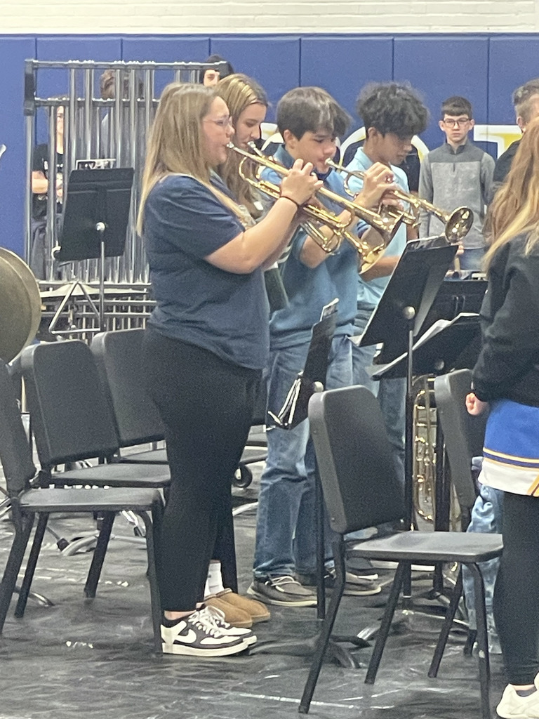 Union Star High School Band trumpet players perform "Taps."